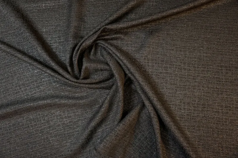 Bouclé mit Lurex – Klassische Raffinesse